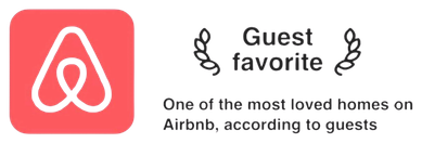 Airbnb Guest Favorite: the Airbnb logo beside laurel branches around the words Guest favorite — one of the most loved homes on Airbnb, according to guests